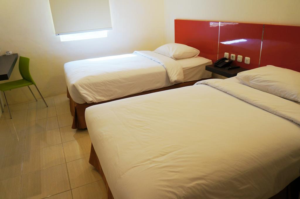 Quin Centro Hotel Palembang Habitación foto