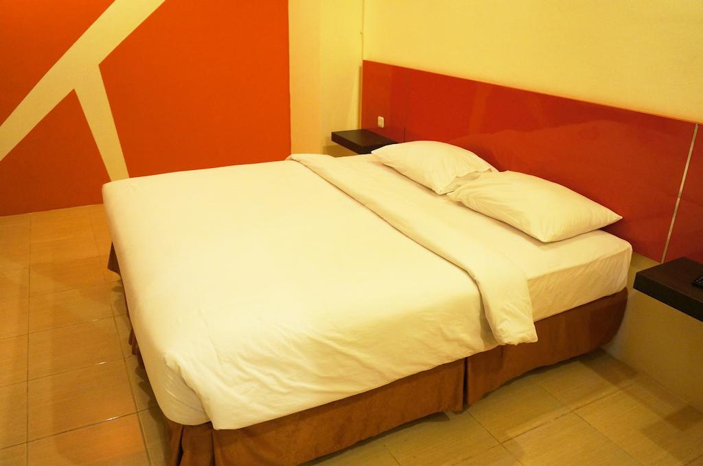 Quin Centro Hotel Palembang Habitación foto