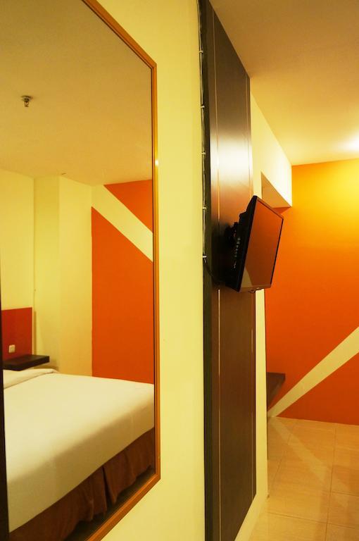 Quin Centro Hotel Palembang Habitación foto