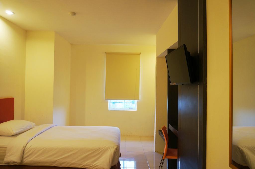 Quin Centro Hotel Palembang Exterior foto