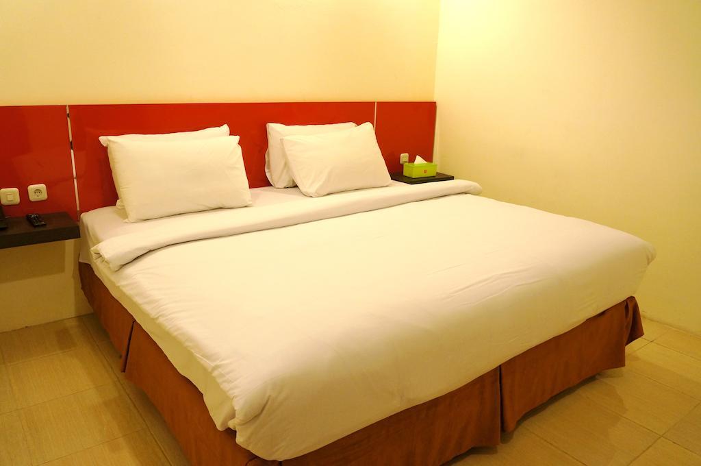 Quin Centro Hotel Palembang Habitación foto